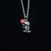 Skiing child necklace