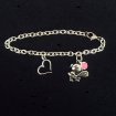 Tennis bracelet with charms